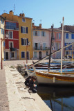 Colorful houses and fishing boats moored in the port of Miroir aux Oiseaux in Martigues, the main attraction in Martigues.