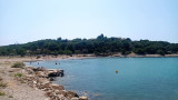 Laurons Beach in Martigues, located on the coastal path with sea views. A hiking route heading towards the port of Carro, following the coastline of the Côte Bleue