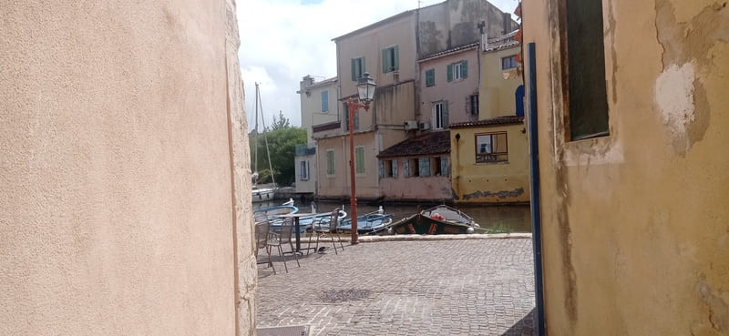 Visiting Martigues' historic district and the Miroir aux Oiseaux (Mirror of Birds) in the town center, near motorhome parking areas