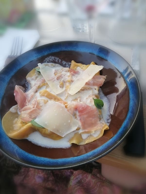 Glass plate with ravioli and Parma ham during a rustic dinner at the Aïoli Caganis farm in Martigues - © Otmartigues / ChristelleR