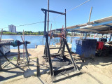 Close-up of Calen fishing equipment used to mechanically lift the fishing nets, in an antique, traditional setting