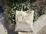 Tote bag beige en coton, dessins de la mer et de Martigues, avec Martigues inscrit en rouge au centre