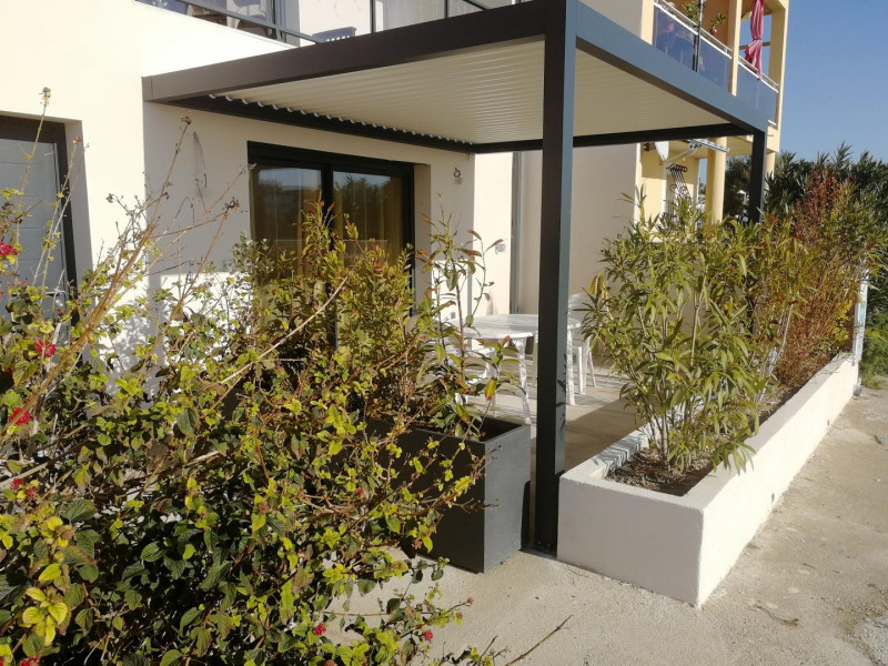 Terrasse avec sa pergola bioclimatique