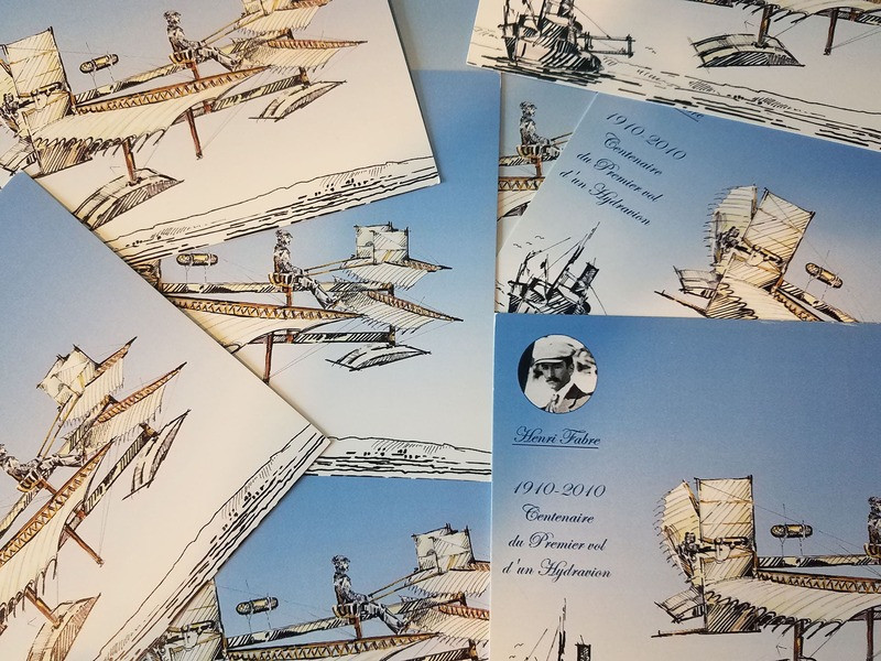 Postcard featuring a concept art drawing of a seaplane, highlighting futuristic lines and an elegant design