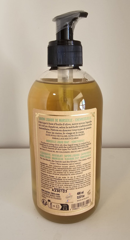 Back label of the 400ml honeysuckle liquid Marseille soap, displaying ingredients and instructions