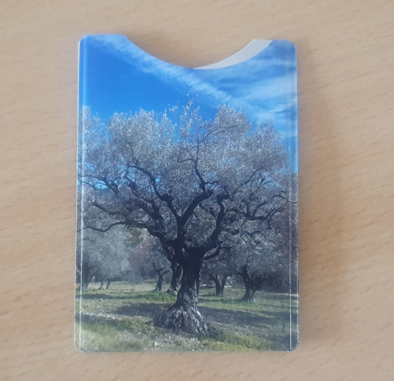 Étui carte bancaire avec motif d’un grand olivier en fleurs