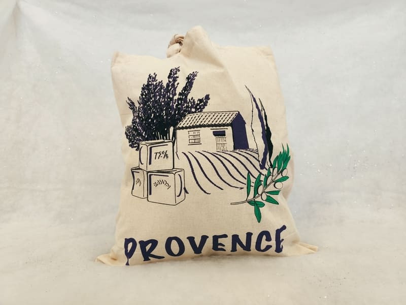Tote bag featuring symbols of Provence in a simple and elegant design, available at the Martigues Tourist Office.