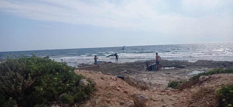 Carro surf spot near the Carro greenway, also known as the Arnettes surf spot. Surfers are on the shore, waiting for the right wave to take them into the water. A wild corner of th - © Otmartigues / MyriamF
